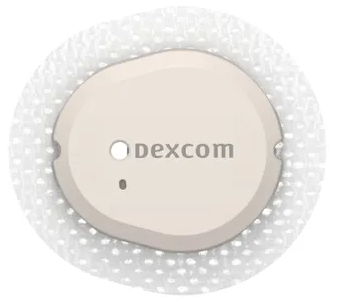 An ovoid white device, it has a small notch on the outer edge and a small hole at one end of the device