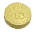 A round yellowish tablet with a 39 etched on it